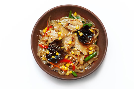 Asian egg noodles with vegetables, mushrooms, green onions and c