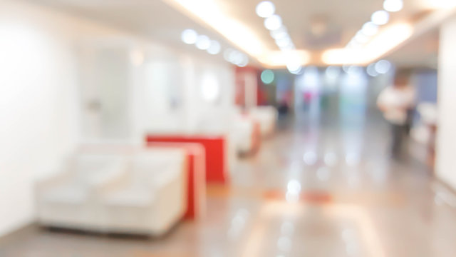 blur image of hospital office room with table and chairs