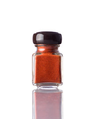Jar Red Paprika Powder Isolated on White