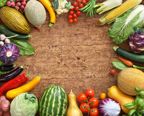 Healthy food background. Studio photo of different fruits and vegetables on old wooden table. High resolution product.