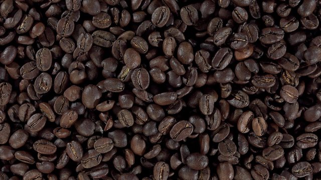 Portion of rotating Coffe Beans (not seamless loopable 4K UHD footage)