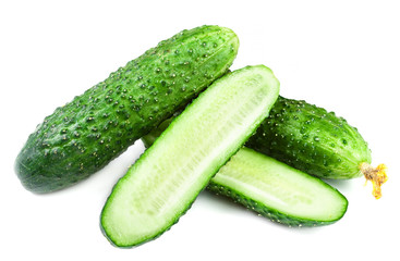 ..Heap of Fresh Cucumber isolated over white background close up