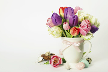Beautiful tulips bouquet and easter eggs