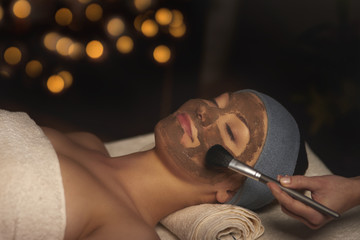 Fototapeta na wymiar Relaxing beauty mask at spa resort