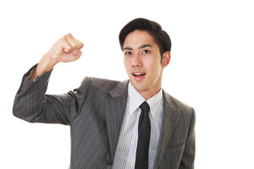 ガッツポーズのビジネスマン