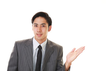 案内するビジネスマン