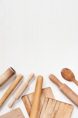 Kitchen utensils on the white wooden table
