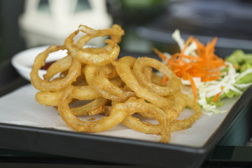 plate of deep fried onion rings