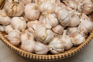 Garlic cloves at market; texture background