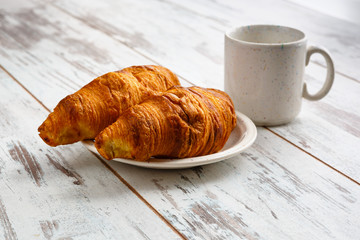 Corissant and milk on light old wooden table