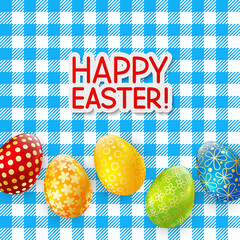 Color Easter eggs on the tablecloth 