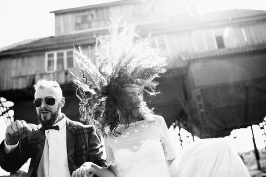 Sunlight is playing with the bride's hair
