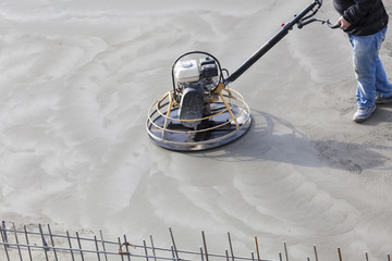 Workers at the construction site of the foundation .concrete resurfacing