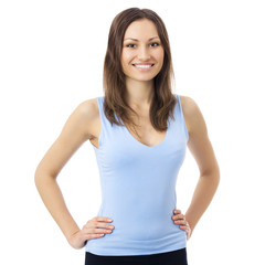 Smiling woman in fitness wear, isolated