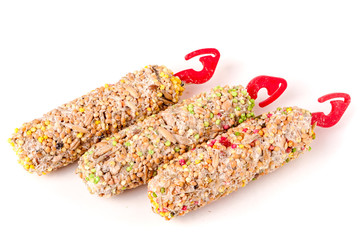 Food for parrots isolated on white background