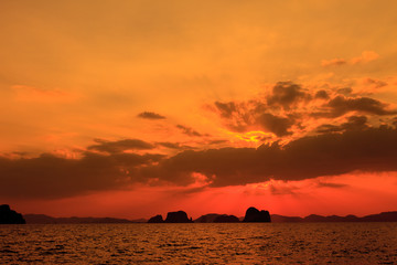 Naklejka na ściany i meble Sunset at seaside beach in Krabi,Thailand.