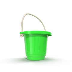 Green plastic bucket with handle up, isolated on white.