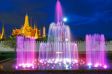 Fototapeta na wymiar Fountain night light of landmark of Sanam Luang and Wat Phra Kaew a beautiful backdrop, Bangkok, Thailand