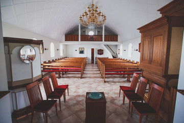 A classic catholic lutheran small church interior with no people inside