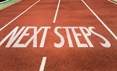 Next Steps written on running track