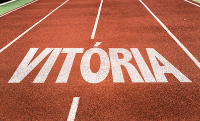 Victory (in Portuguese) written on running track