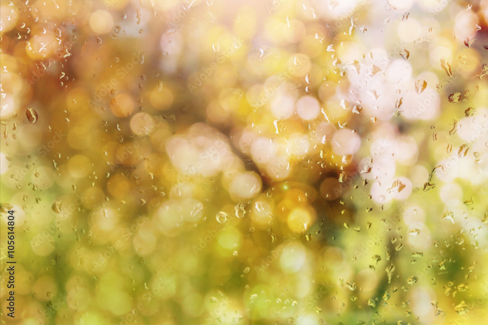 Wall mural abstract blurred background with rain drop on glass mirror