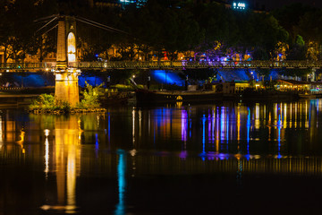 Fototapeta na wymiar Bridge over Rhone river in Lyon, France at night