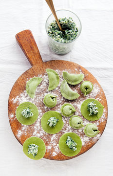 Green stuffed pasta. different types of filled pasta