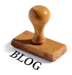 Single wooden rubber stamp with blog text