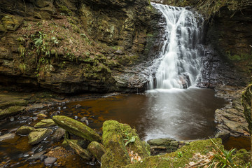 Naklejka na ściany i meble Hareshaw Linn. Waterfall near Bellingham in the county of Northumberland, England, UK.