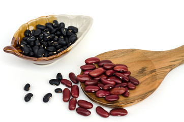 Black bean and red kidney bean isolated on white