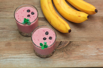 fruit smoothies and a bunch of bananas