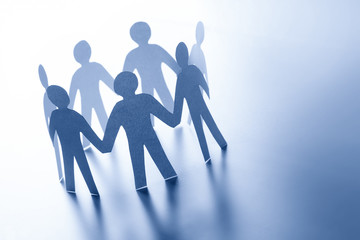 Paper people standing together hand in hand. Team, glabal business connection concept
