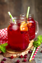 Iced cranberry tea with orange.