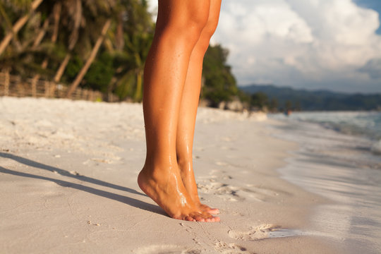 Legs on the sand