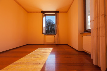 Empty room with parquet floor
