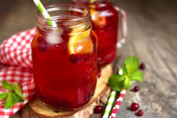 Iced cranberry tea with orange.