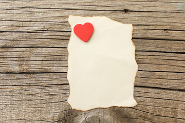 Heart on vintage paper with copy space