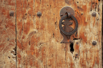 Old lock of a wooden door. Empty copy space for editor's text.