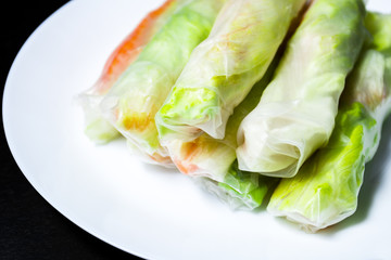 Spring rolls on a dark background
