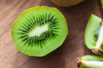 Kiwi fruit on wooden background