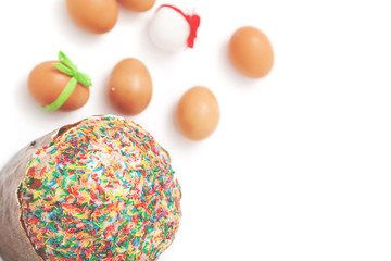 Easter cake and Easter eggs on white background