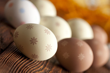 Patterned Easter eggs on wooden table