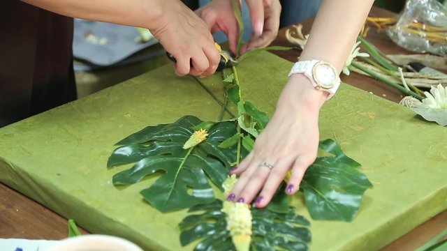 Girl makes spring floral applique.