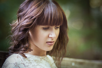 Naklejka premium Beautiful girl with long wavy hair .