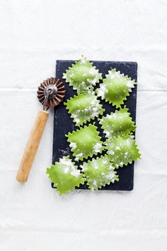 Green stuffed pasta. different types of filled pasta