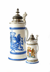 Two vintage beer mugs with  bavarian Coat of Arms Lion isolated over a white background