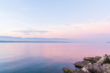 Nice pink colors reflected on the lake at sunset
