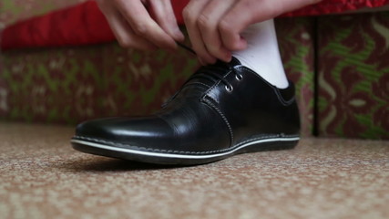 the groom before the wedding dress shoes