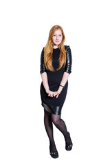Fototapeta premium Red haired girl in black dress isolated on white background